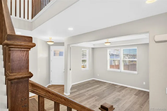a view of a livingroom with a ceiling fan