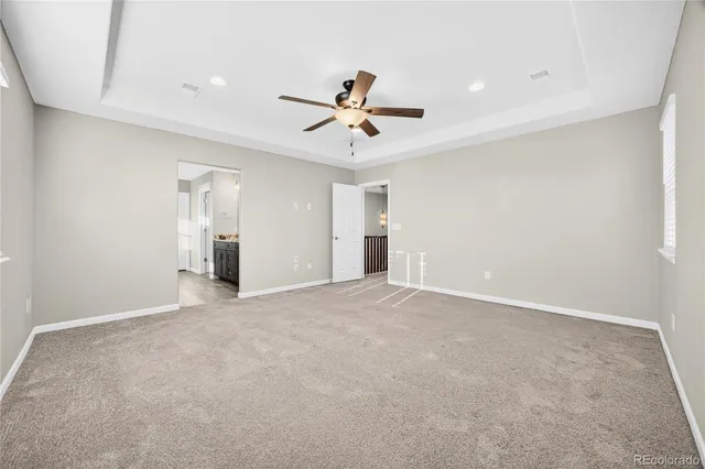 a view of a porch with a table and chair