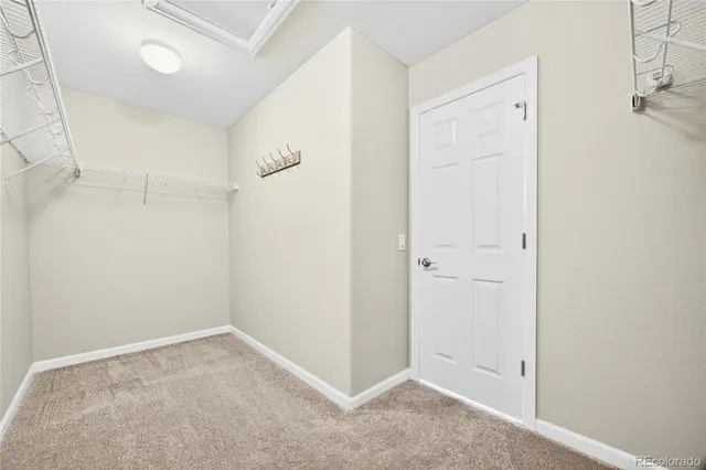a bathroom with a sink double vanity and a mirror