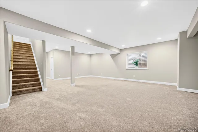 a bathroom with a sink a toilet a tub and shower