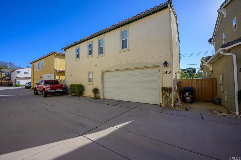 1451 Montage Escondido, CA 92029 - Photo 11 of 17 a view of car parked front of house
