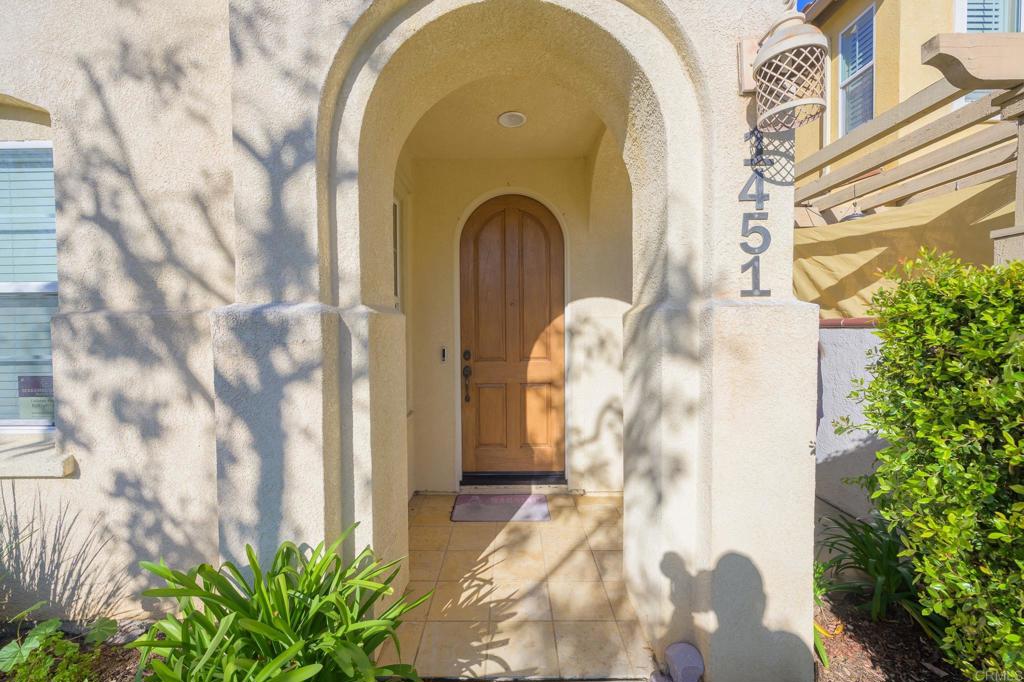 1451 Montage Escondido, CA 92029 - Photo 2 of 17 a front view of a house with a yard
