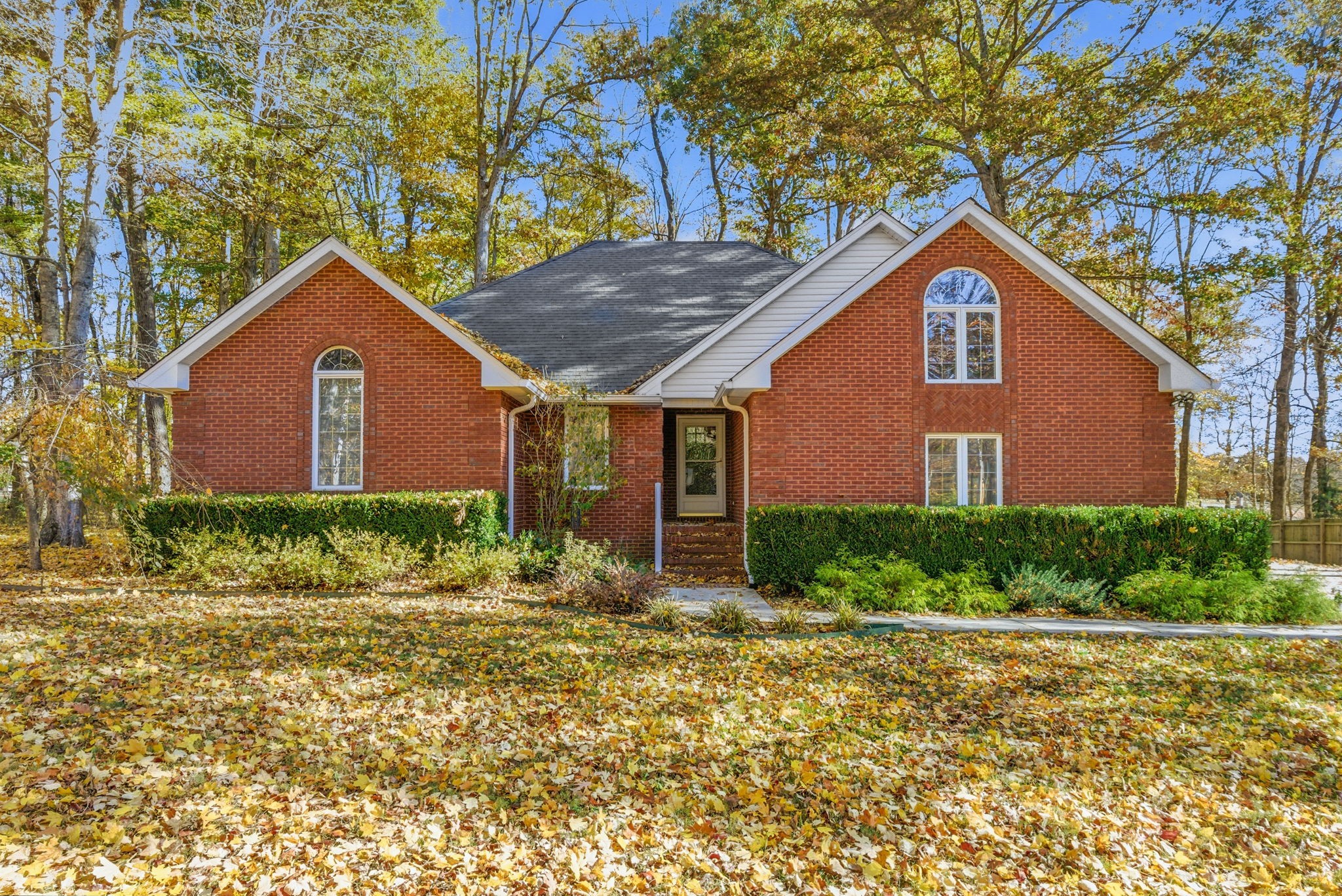 a house view with a garden space