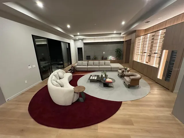 a room with furniture and a flat screen tv