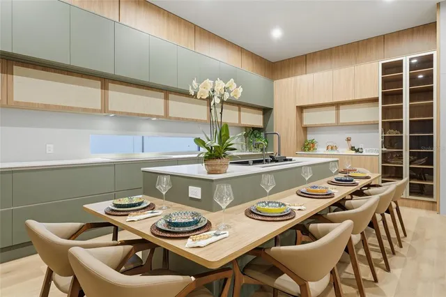a table and chairs in a kitchen