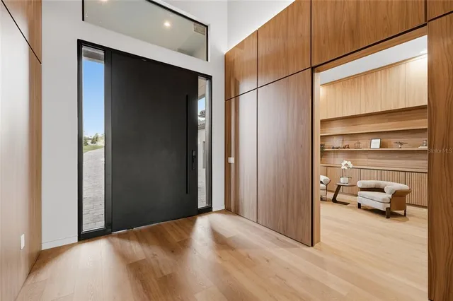 a view of a livingroom with furniture and a window