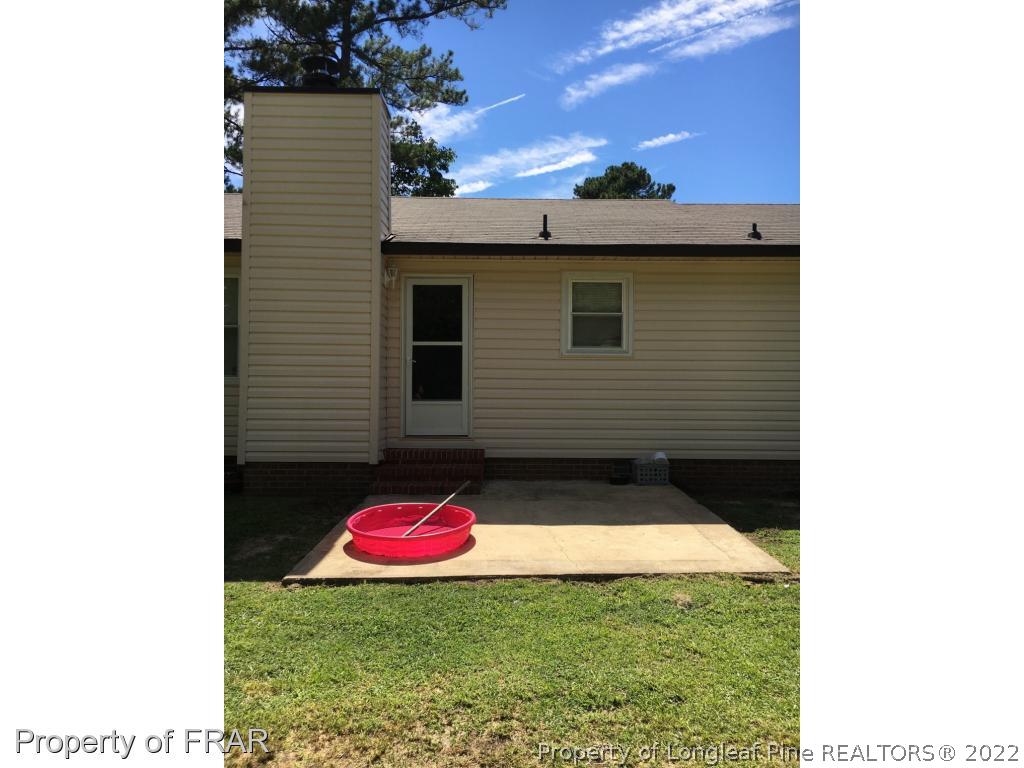 1733 Rim Road Fayetteville, NC 28314 - Photo 20 of 23 a backyard of a house
