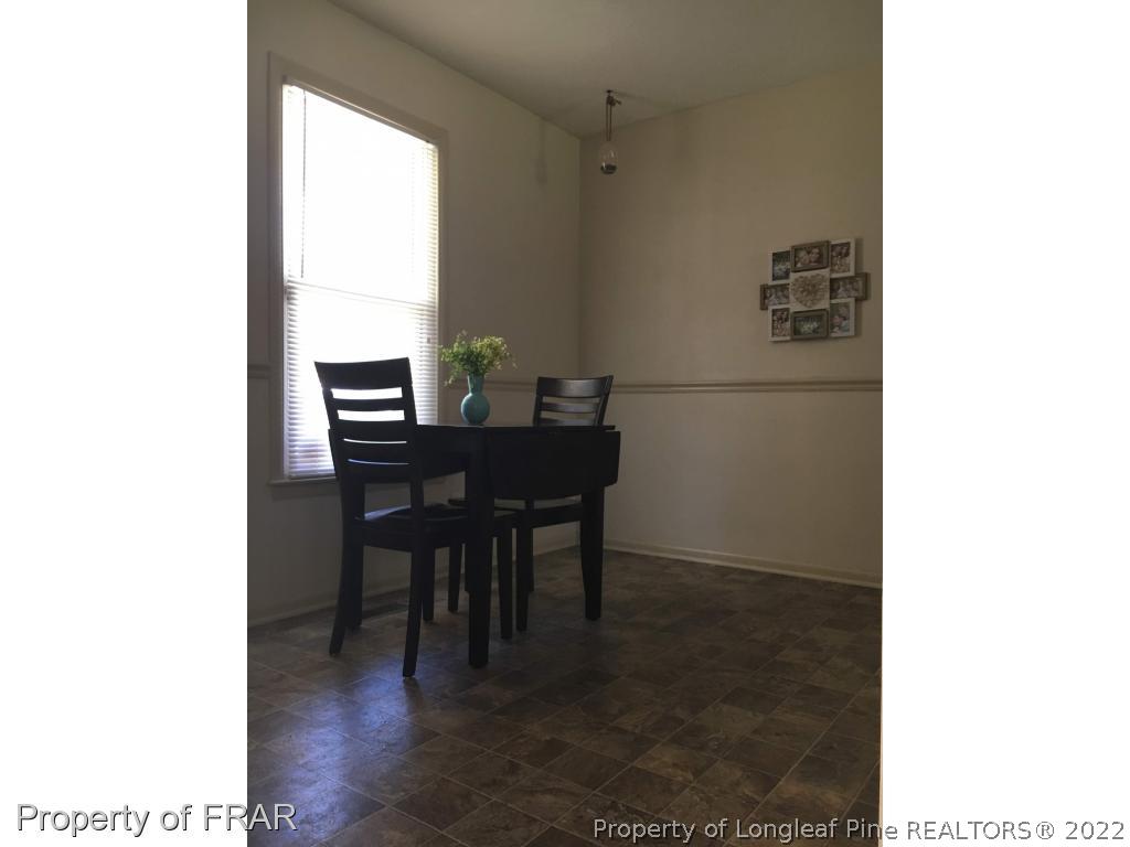 1733 Rim Road Fayetteville, NC 28314 - Photo 10 of 23 a workspace with furniture and window