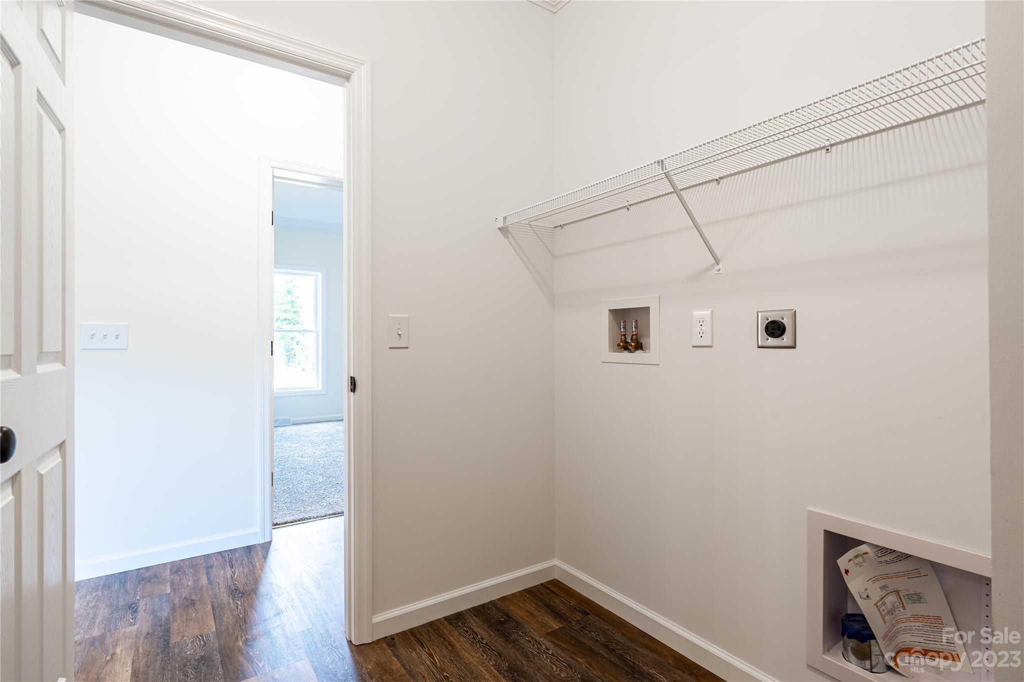 85 Rocky Lane Road Clyde, NC 28721 - Photo 29 of 37 a view of a storage & utility room with wooden floor