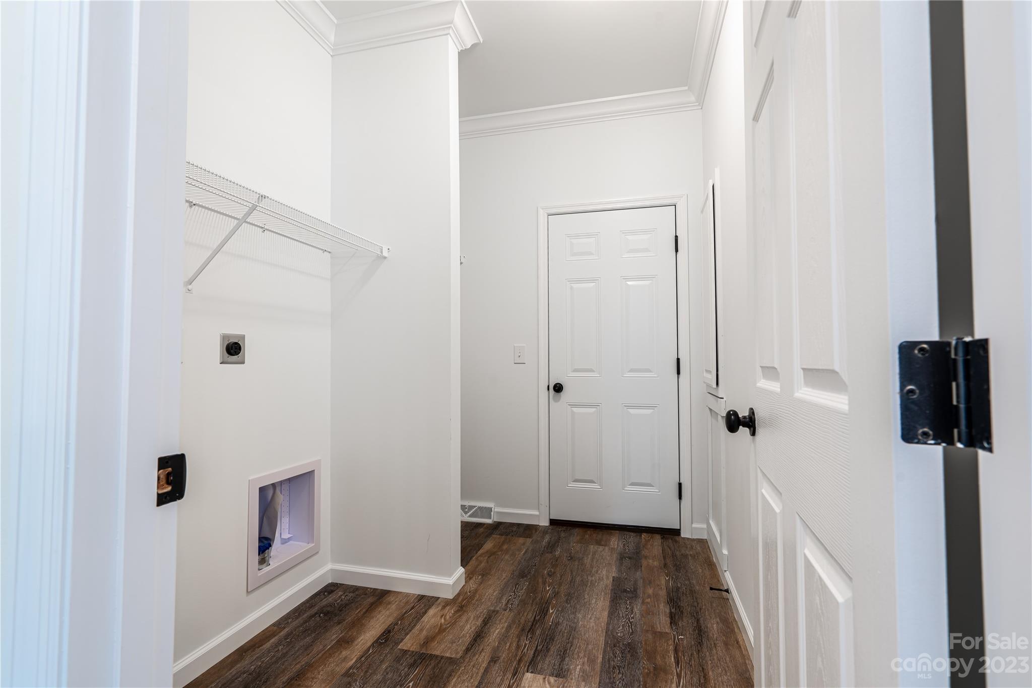 85 Rocky Lane Road Clyde, NC 28721 - Photo 31 of 37 a view of a hallway with wooden floor and staircase