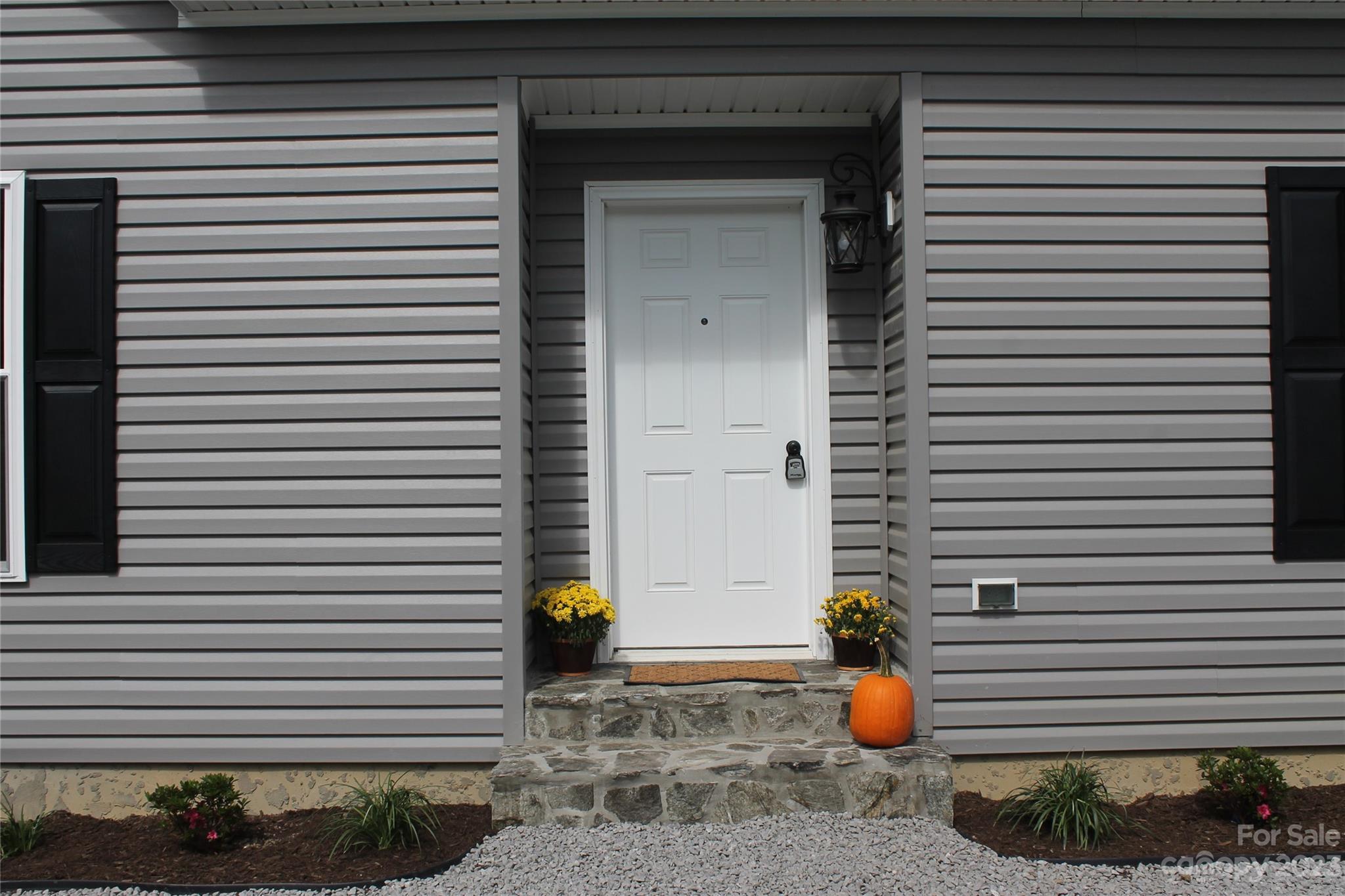 85 Rocky Lane Road Clyde, NC 28721 - Photo 4 of 37 a view of a porch with seating space