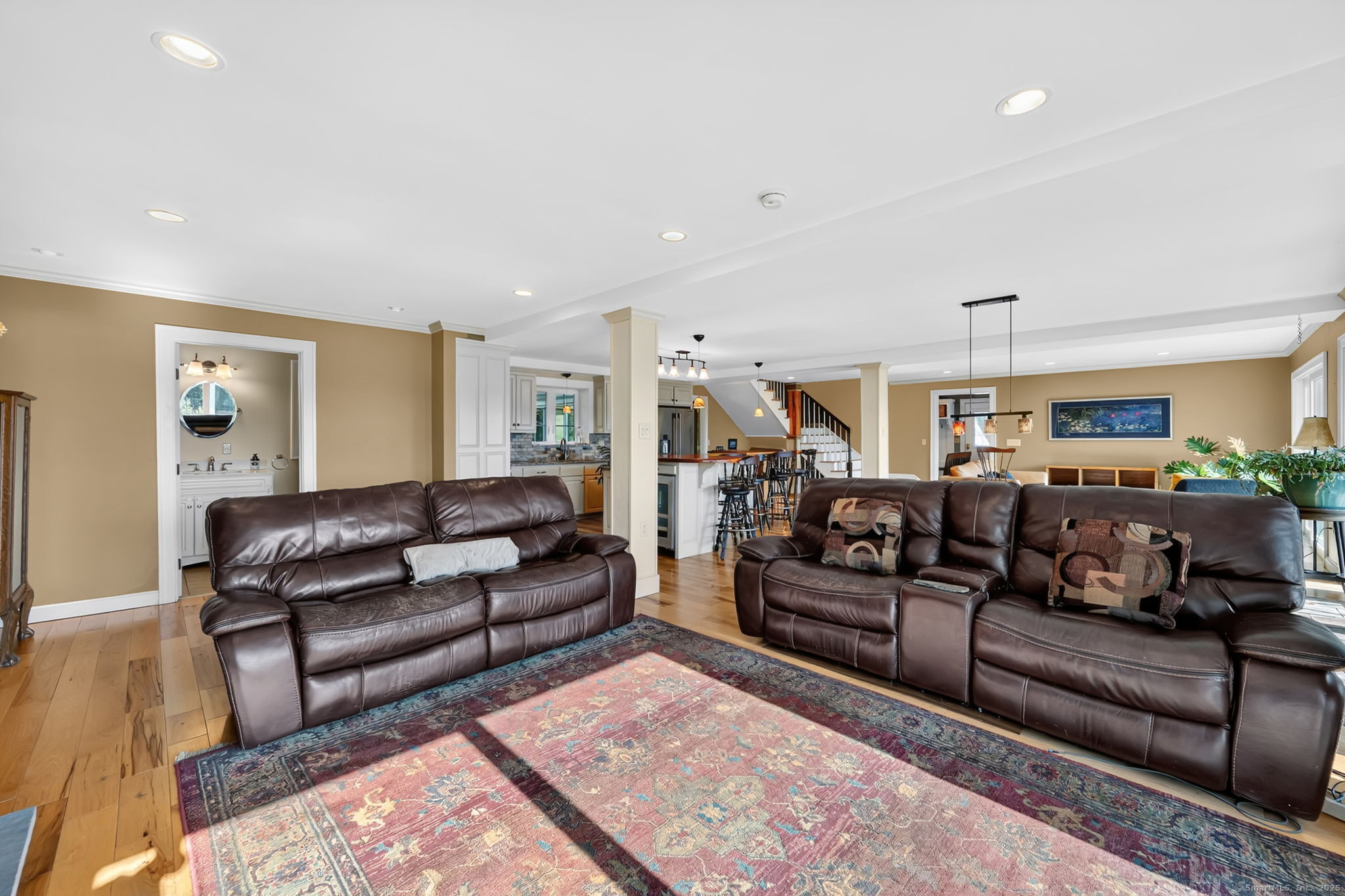 24 Coppergate Road East Granby, CT 06026 - Photo 23 of 39 a living room with furniture and a rug