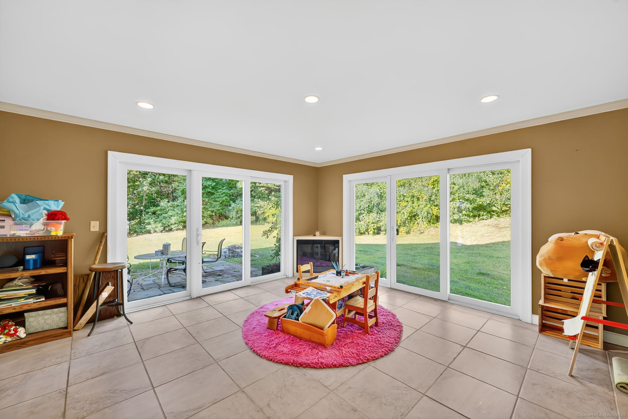 24 Coppergate Road East Granby, CT 06026 - Photo 25 of 39 a living room with furniture a large window and a sink