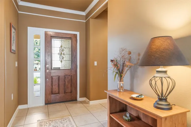 a view of kitchen with a sink and a mirror