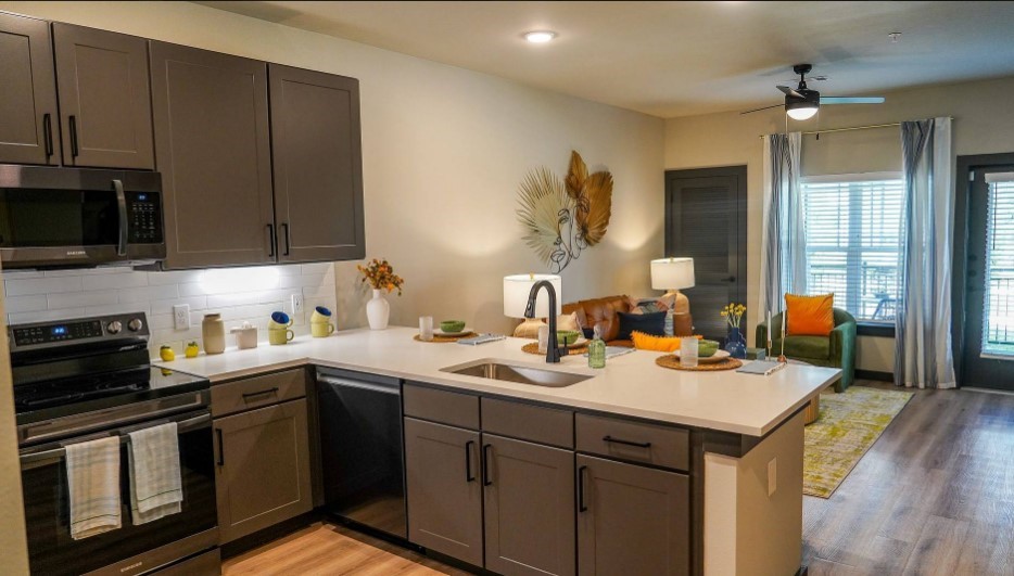 2953 Fm 2920 Rd Spring, Unit 8306 Spring, TX 77388 - Photo 4 of 36 a kitchen with a sink a stove and cabinets