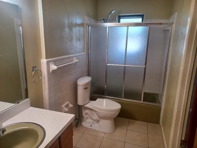 a bathroom with a sink and toilet