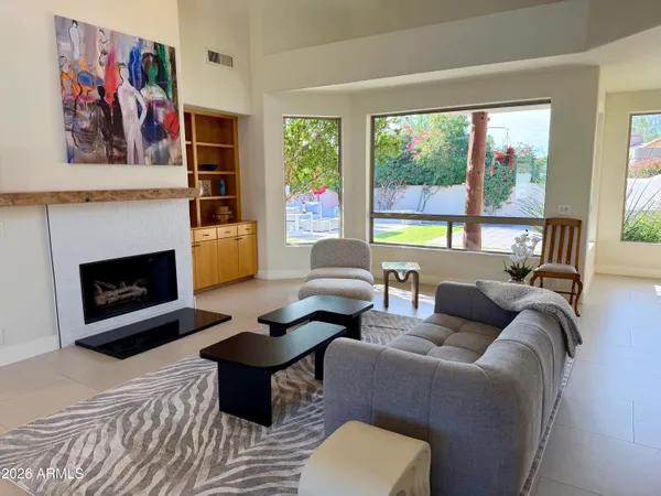 a living room with a couch and a table