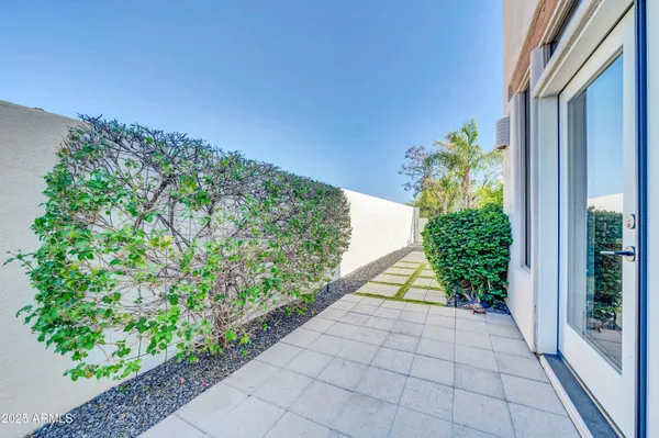 an aerial view of residential house with outdoor space and swimming pool