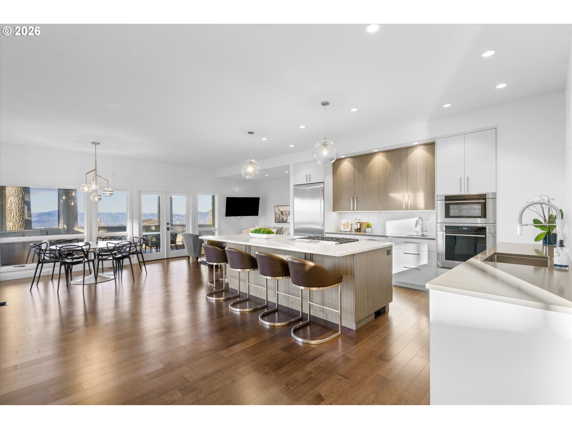 72 Nansen Summit Lake Oswego, OR 97035 - Photo 16 of 48 a living room with stainless steel appliances kitchen island granite countertop furniture and a kitchen view