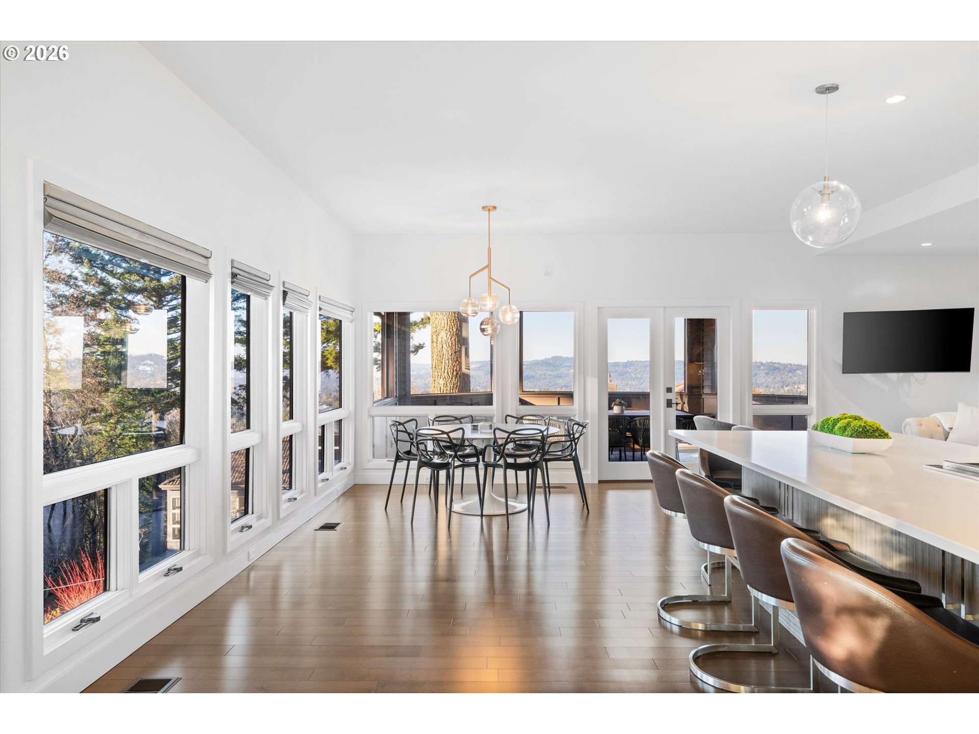 72 Nansen Summit Lake Oswego, OR 97035 - Photo 17 of 48 a dining room with furniture water view and large windows