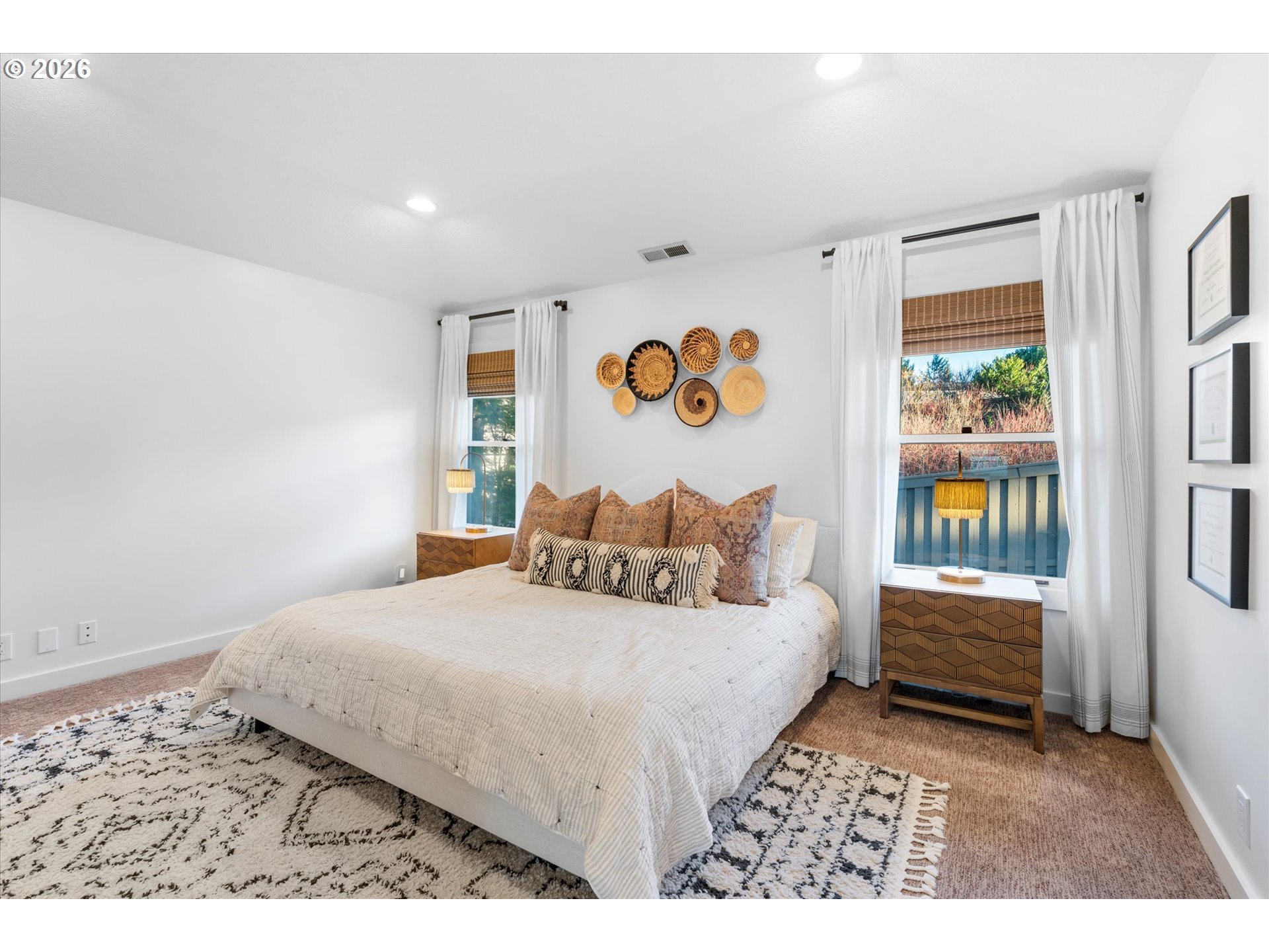 72 Nansen Summit Lake Oswego, OR 97035 - Photo 33 of 48 a bedroom with a bed and a painting on the wall