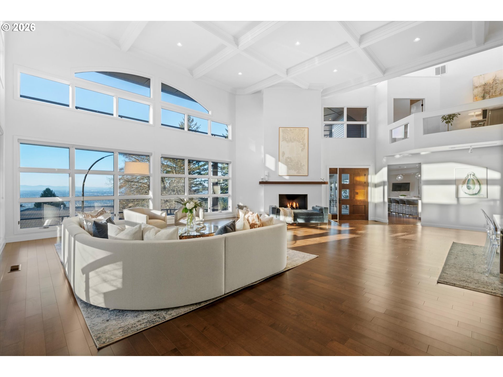 72 Nansen Summit Lake Oswego, OR 97035 - Photo 6 of 48 a living room with fireplace furniture and a large window