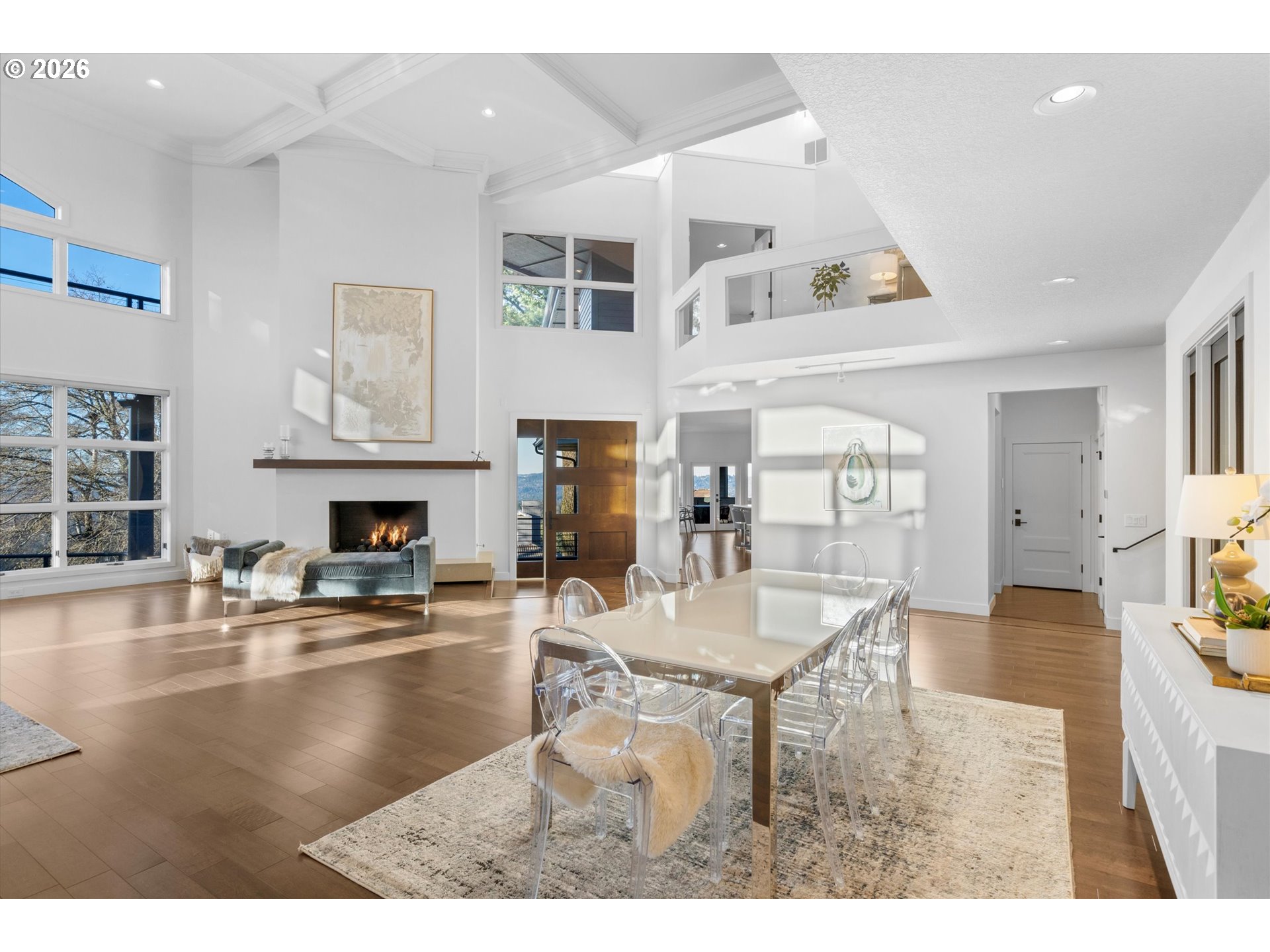 72 Nansen Summit Lake Oswego, OR 97035 - Photo 7 of 48 a dining room with wooden floor a glass table and chairs