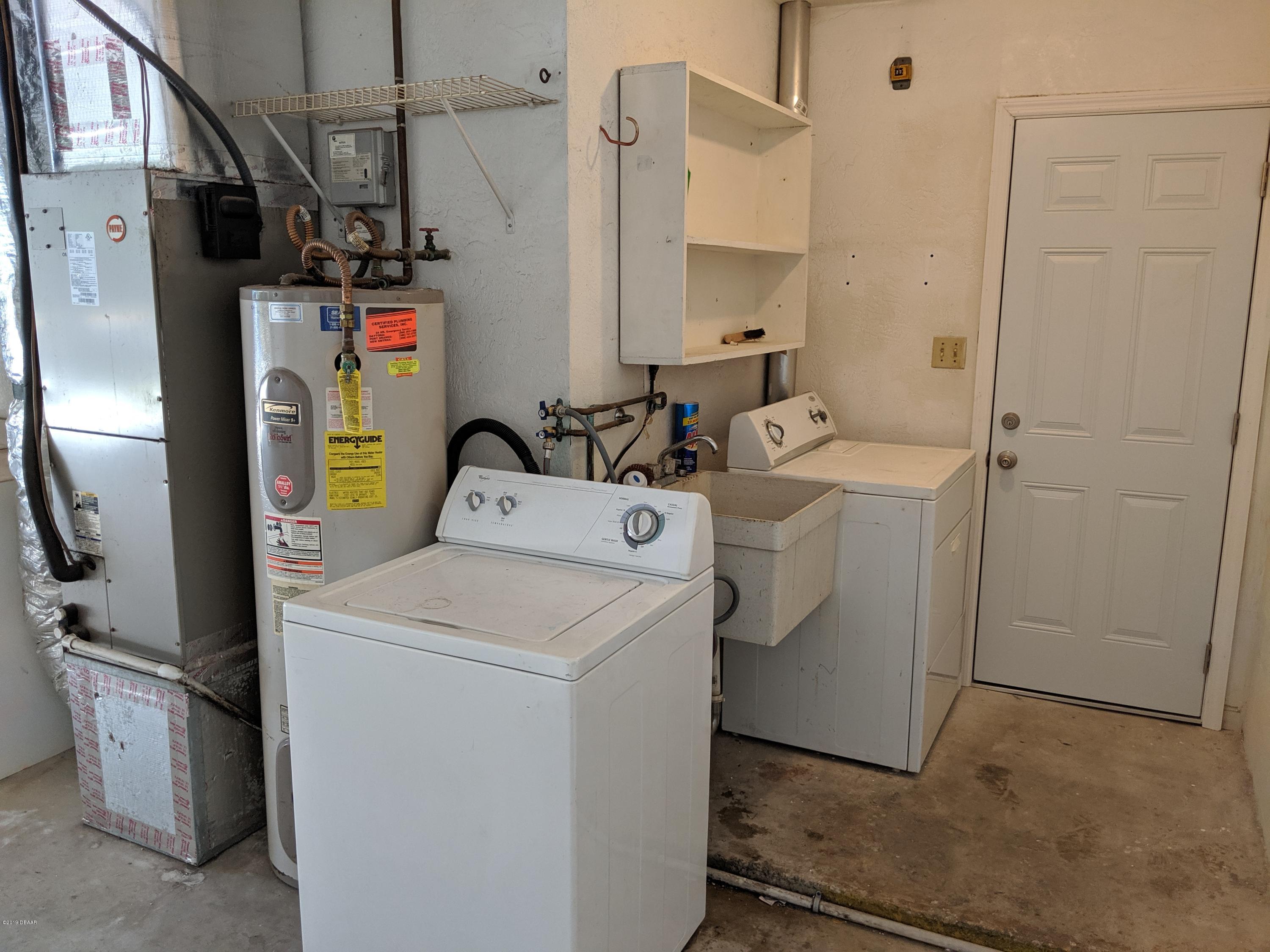 714 South Center Street Ormond Beach, FL 32174 - Photo 19 of 25 a utility room with dryer and washer