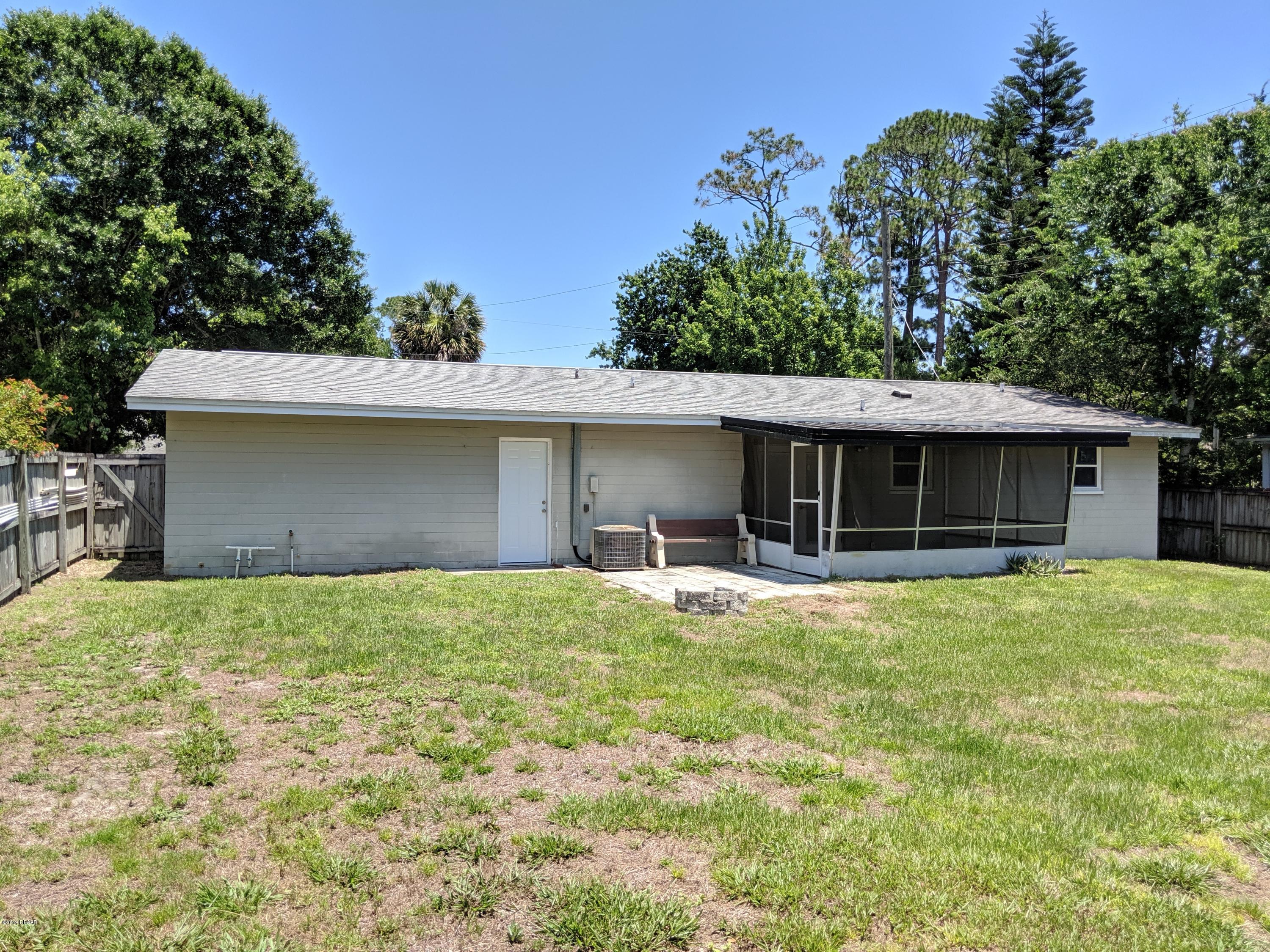 714 South Center Street Ormond Beach, FL 32174 - Photo 24 of 25 front view of a house with a yard