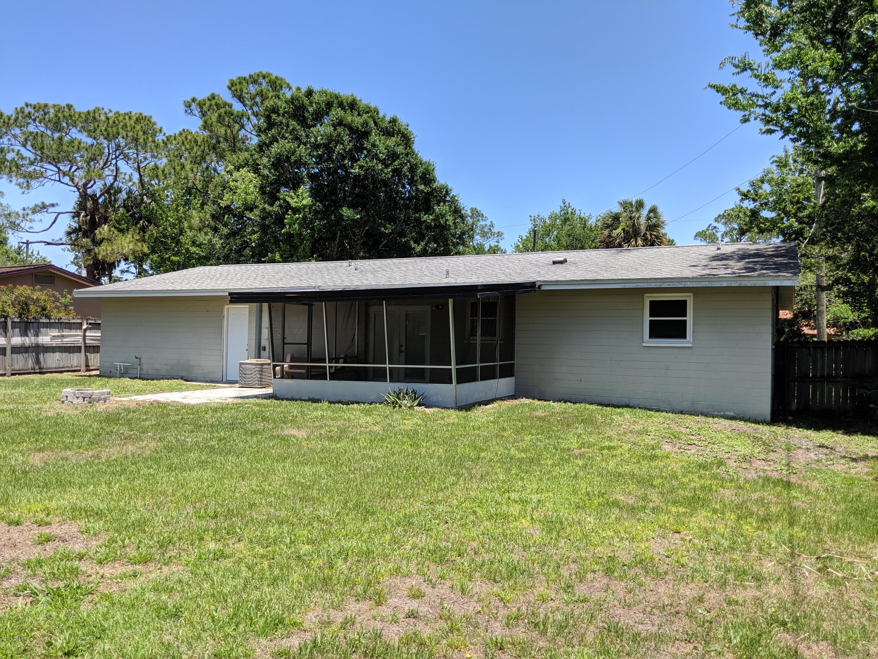 714 South Center Street Ormond Beach, FL 32174 - Photo 25 of 25 a house view with a garden space