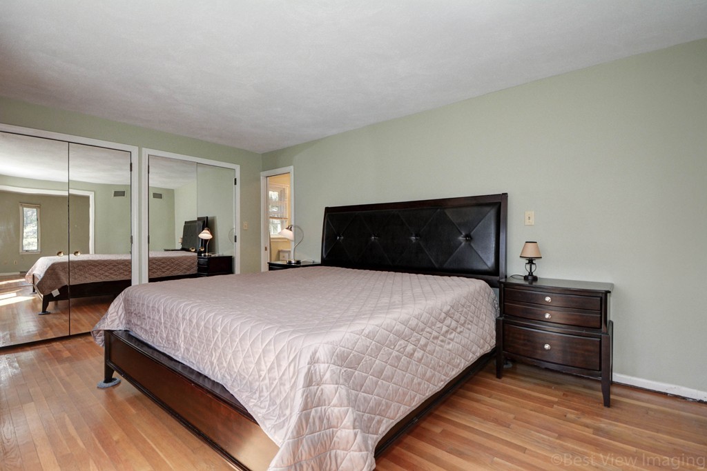 2 Linwood Road Framingham, MA 01702 - Photo 13 of 28 a bedroom with a bed and a large window