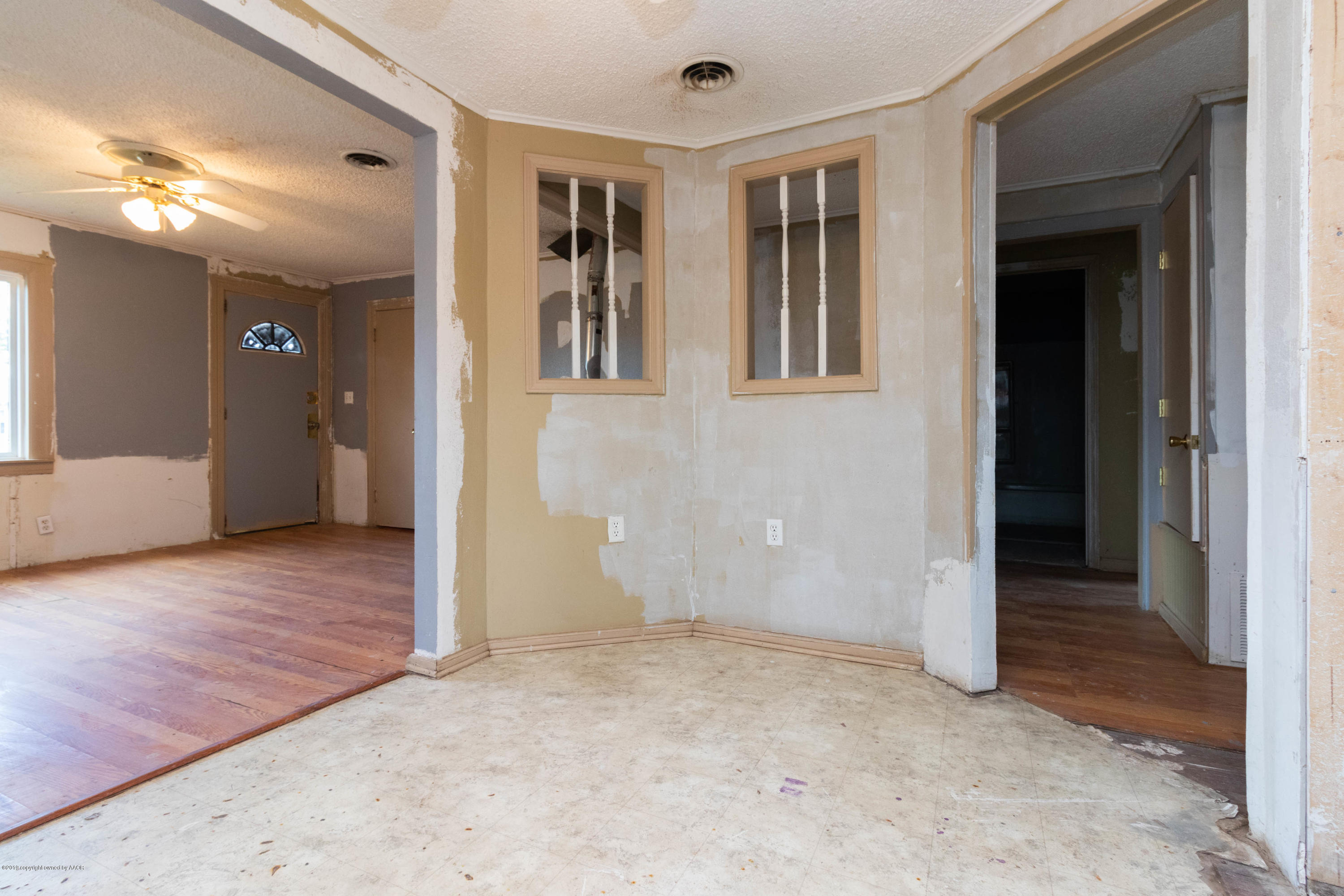 4002 South Harrison Street Amarillo, TX 79110 - Photo 9 of 21 wooden floor and windows in a room