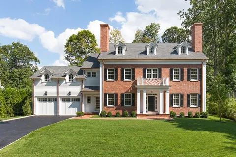 front view of a building with a yard