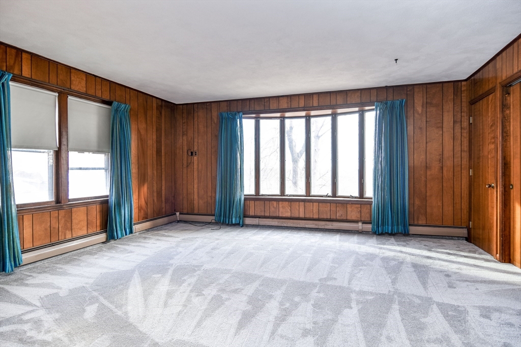 85 Barber Road Framingham, MA 01702 - Photo 12 of 30 a view of an empty room with a window
