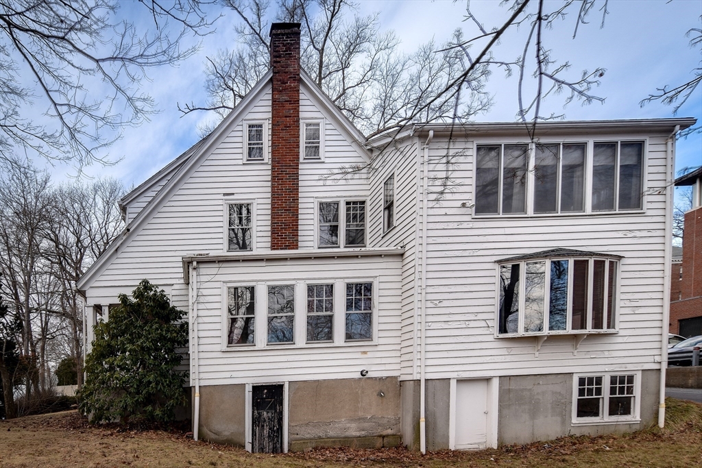 85 Barber Road Framingham, MA 01702 - Photo 2 of 30 a front view of a house with large windows