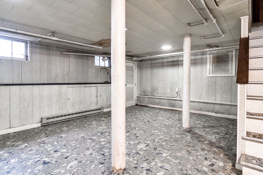 85 Barber Road Framingham, MA 01702 - Photo 25 of 30 a view of a room with racks on the wall