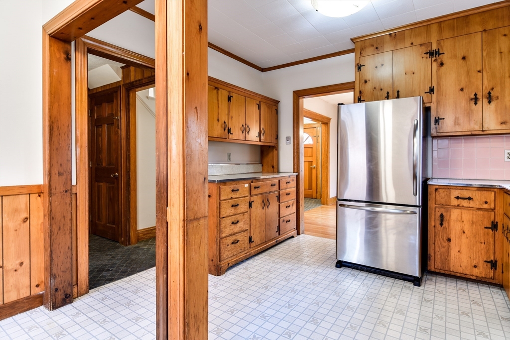85 Barber Road Framingham, MA 01702 - Photo 9 of 30 a kitchen with stainless steel appliances a refrigerator and a stove top oven