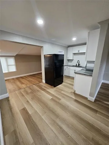 a view of a kitchen with a sink