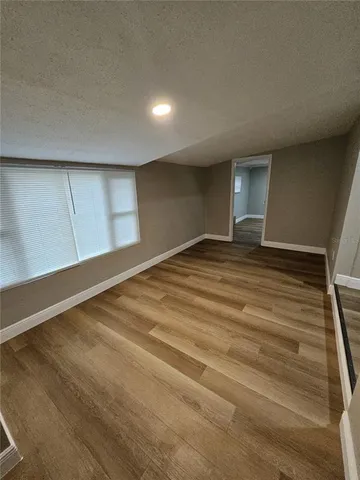 a view of an empty room and window