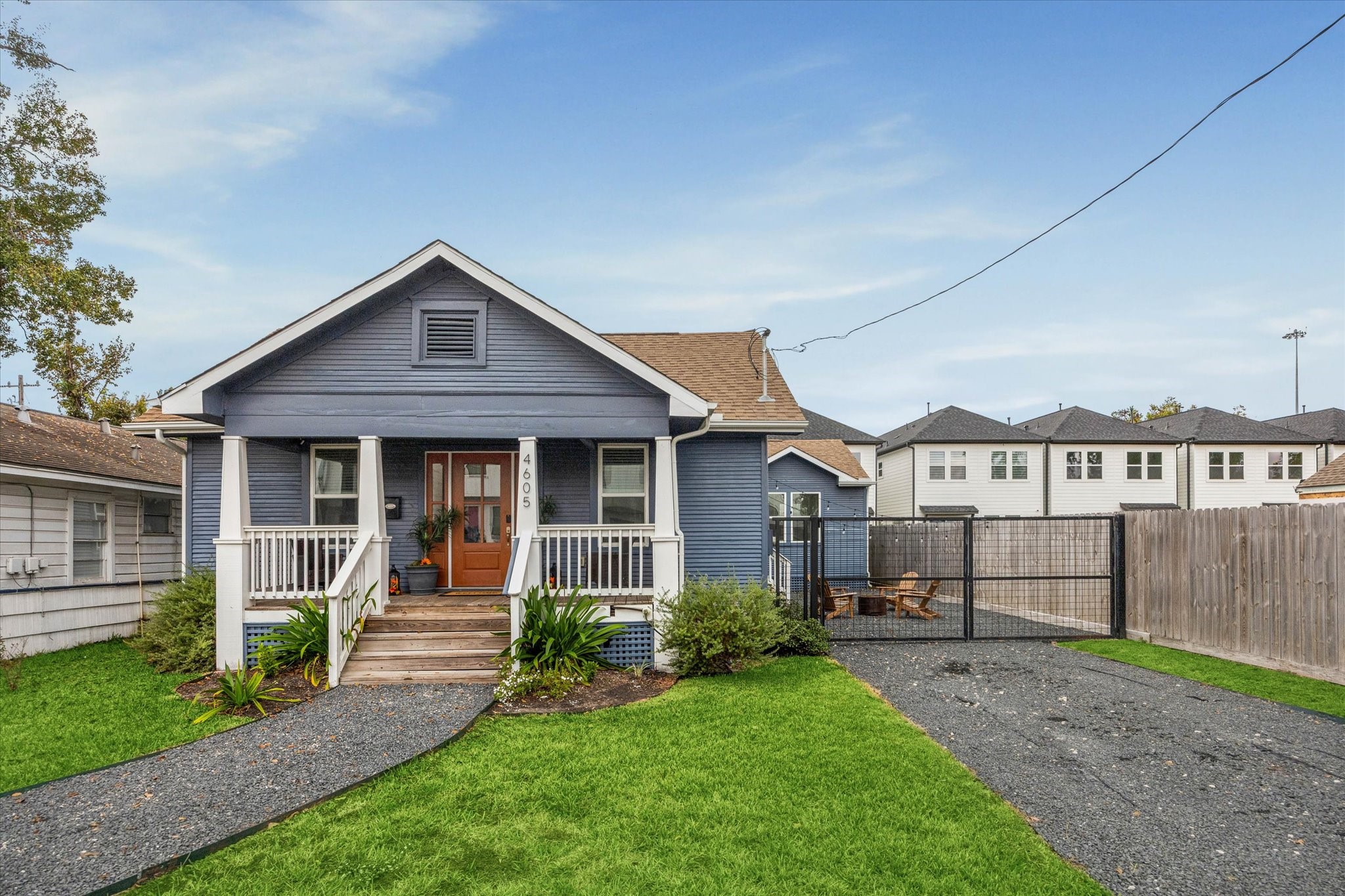 4605 Fisk Street Houston, TX 77009 - Photo 1 of 22 a front view of a house with a yard