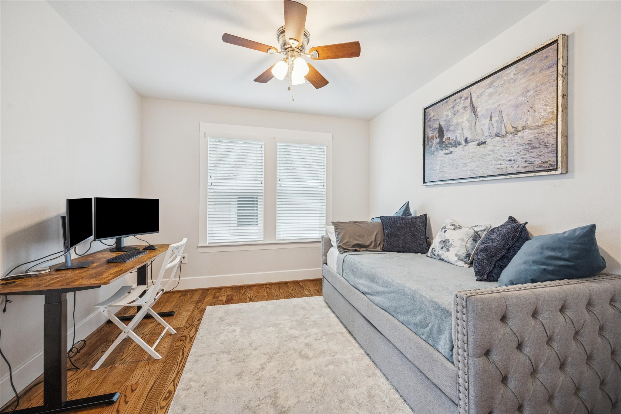 4605 Fisk Street Houston, TX 77009 - Photo 15 of 22 a living room with furniture and a flat screen tv