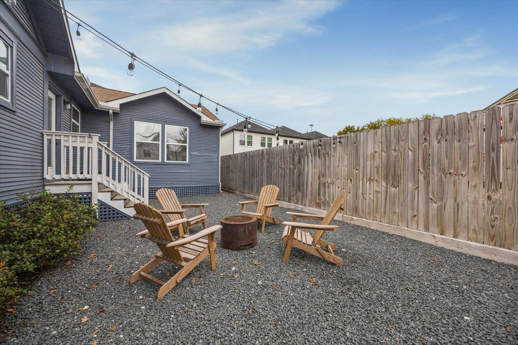 4605 Fisk Street Houston, TX 77009 - Photo 19 of 22 an outdoor view of a house with backyard and sitting area