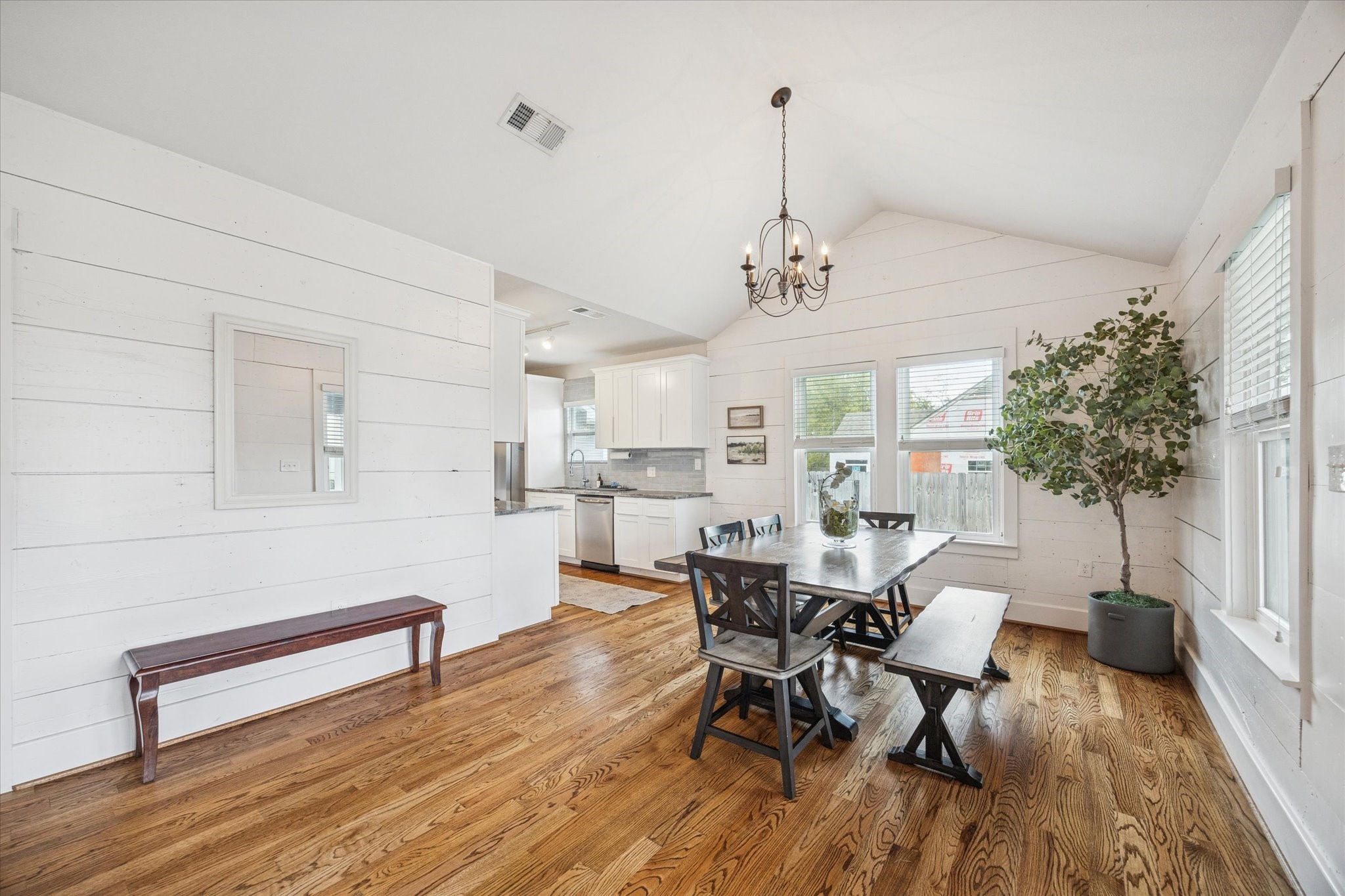 4605 Fisk Street Houston, TX 77009 - Photo 6 of 22 a view of a dining room with furniture and wooden floor
