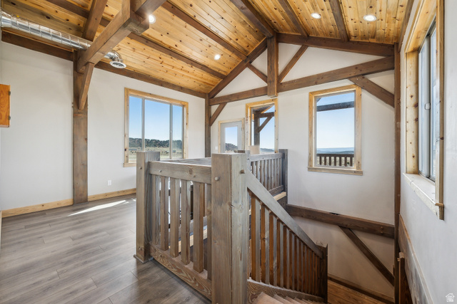 46997 West Thunder Road Fruitland, UT 84027 - Photo 16 of 49 Hall with an upstairs landing, plenty of natural light, hardwood / wood-style flooring, wooden ceiling, and recessed lighting