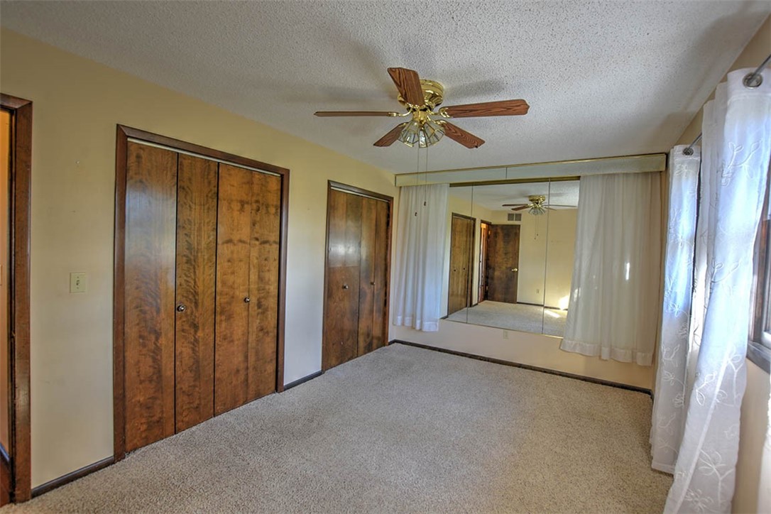 3441 Ferris Drive Decatur, IL 62521 - Photo 15 of 30 a view of a hallway with wooden floor and closet area