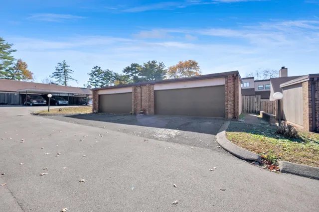 a view of a house with a street