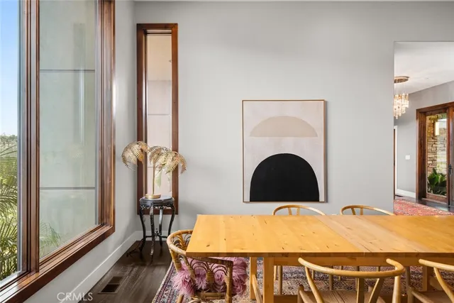 a bedroom with a bed and a television