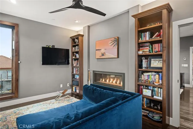 a bedroom with a large bed and a large window