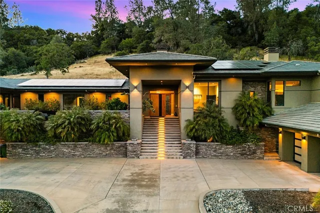 a view of balcony with furniture