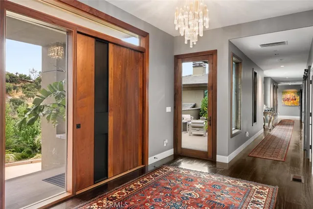 a kitchen with granite countertop a stove and a sink